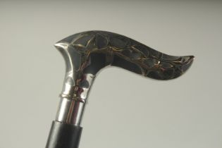 A WALKING STICK WITH CHROME HANDLE "HEAD".