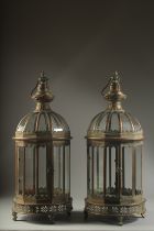 A PAIR OF COPPER METAL GLAZED LANTERNS. 24ins high.