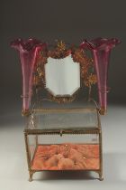 A GOOD CIRCA 1900 FRENCH GILT METAL AND GLASS DRESSING TABLE BOX with mirror, a pair of ruby glass