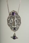 A SILVER AND AMETHYST SCARAB NECKLACE.