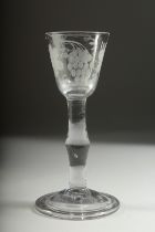 A GEORGIAN WINE GLASS with knop stem, the bowl engraved with fruiting vines. 5.5ins high.