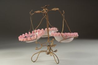 A GOOD CIRCA 1900 FRENCH GILT METAL TABLE CENTRPIECE with pink glass bowls. 8ins high.