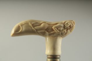 A WALKING STICK WITH CARVED BONE HANDLE "NUDE".