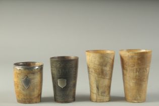 FOUR ENGRAVED HORN BEAKERS. 4.75, 4.5, 4 & 3.5ins. Etched THOMAS with animals, THOMAS with a tree,