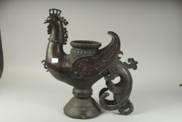 A LARGE AND HEAVY CHINESE BRONZE BIRD CENSER.