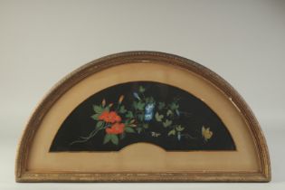 A GOOD VICTORIAN FAN SHAPED FLORAL PICTURE with flowers and butterflies. 20ins x 7.5ins in a glass