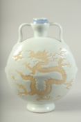A CHINESE TWIN HANDLE DRAGON MOON FLASK. 28cms high.