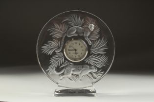 A GOOD LALIQUE CIRCULAR GLASS CLOCK with two panthers. 5ins diameter in a Lalique box.