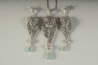 A GOOD SILVER AND MARCASITE PANTHER PENDANT, EARRINGS AND CHAIN, boxed.