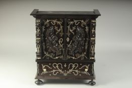 A SUPERB 19TH CENTURY MINIATURE ROSEWOOD INLAID CABINET, the top with double panel doors opening