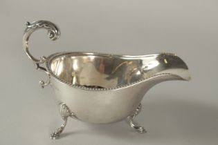 A SILVER SAUCE BOAT. London 1930.