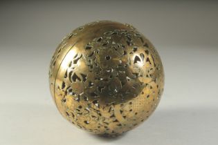 AN 18TH CENTURY BRASS PIERCED BALL POMANDER. 5.5ins diameter.