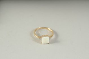 A 9CT GOLD OPAL AND DIAMOND RING, boxed.