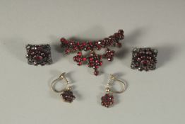 A SUITE OF GARNET JEWELLERY, TWO PAIRS OF EARRINGS, boxed.