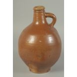 A GOOD LARGE BELLARMINE SALT GLAZED JUG. 11ins high.