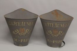 A PAIR OF GREY CHATEAUNEUF-DU-PAPE GRAPE CARRIERS.
