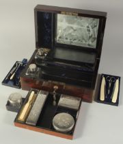 A VERY GOOD VICTORIAN LADIES ROSEWOOD DRESSING CASE with brass banding opening to reveal five silver