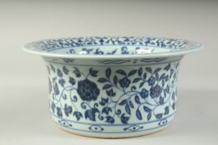 A CHINESE BLUE AND WHITE PORCELAIN WASH POT decorated with lotus, the interior with lucky symbols.