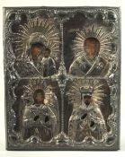 A 19TH CENTURY RUSSIAN SILVER MOUNTED ICON with four figures including The Madonna and Child. Silver