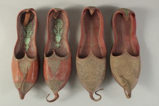 TWO PAIRS OF 19TH CENTURY OTTOMAN TURKISH OR MOROCCAN SILVER EMBROIDERED LEATHER SHOES, one with