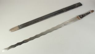AN UNUSUAL OMANI SWORD AND SCABBARD, the sword with fullered jagged blade, silver threaded leather