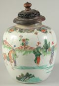 A CHINESE FAMILLE VERTE PORCELAIN JAR AND HARDWOOD COVER, finely decorated with a procession