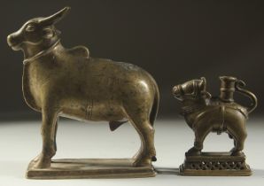 TWO 18TH CENTURY SOUTH INDIAN BRONZE NANDI BULLS, largest 12cm long (2).