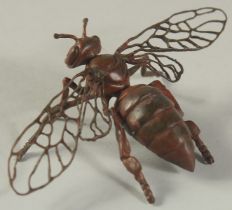 A BRONZE OKIMONO OF A FLOWER FLY, 6cm long.