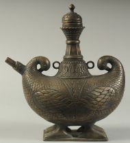 A FINE AND LARGE INDIAN BOAT SHAPED BRASS LIDDED EWER, with two duck shaped terminals to the side,