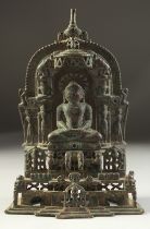 A VERY FINE AND RARE 14TH-15TH CENTURY SOUTH INDIAN SILVER INLAID BRONZE JAIN SHRINE, with