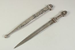 A 19TH CENTURY CAUCASIAN NIELLO SILVER KINDJAL DAGGER AND SCABBARD, with fullered blade, 49.5cm