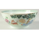 AN 18TH CENTURY CHINESE FAMILLE ROSE PORCELAIN BOWL, the exterior painted with a scene of deer