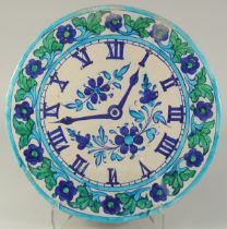 A VERY UNUSUAL LARGE 19TH CENTURY NORTH INDIAN MULTAN GLAZED POTTERY CLOCK FACE TILE, made for the