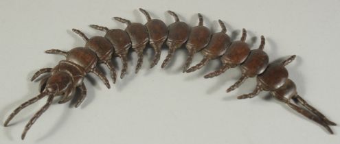 AN ARTICULATED BRONZE OKIMONO OF A CENTIPEDE, 15.5cm long.