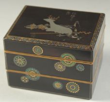 A FINE JAPANESE SIGNED THREE-TIER LACQUER BOX, decorated with a deer and crane; delicately inlaid