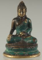 A SMALL TIBETAN GILT BRONZE BUDDHA, 7cm high.