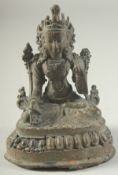 A SMALL BRONZE FIGURE OF A SEATED DEITY, 13cm high.