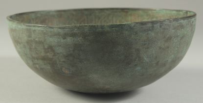 A RARE 10TH-11TH CENTURY PERSIAN GAZNAVID BRONZE BOWL, with fine Kufic calligraphy to the