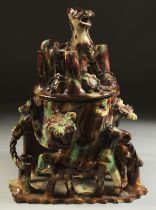 AN OTTOMAN TURKISH CANAKKALE GLAZED POTTERY SWEET BOX / TABLE PIECE, with moulded animals and flower