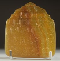 A VERY LARGE AND FINE PERSIAN POSSIBLY QAJAR ENGRAVED CALLIGRAPHIC YELLOW AGATE PENDANT, 9cm x 7cm.