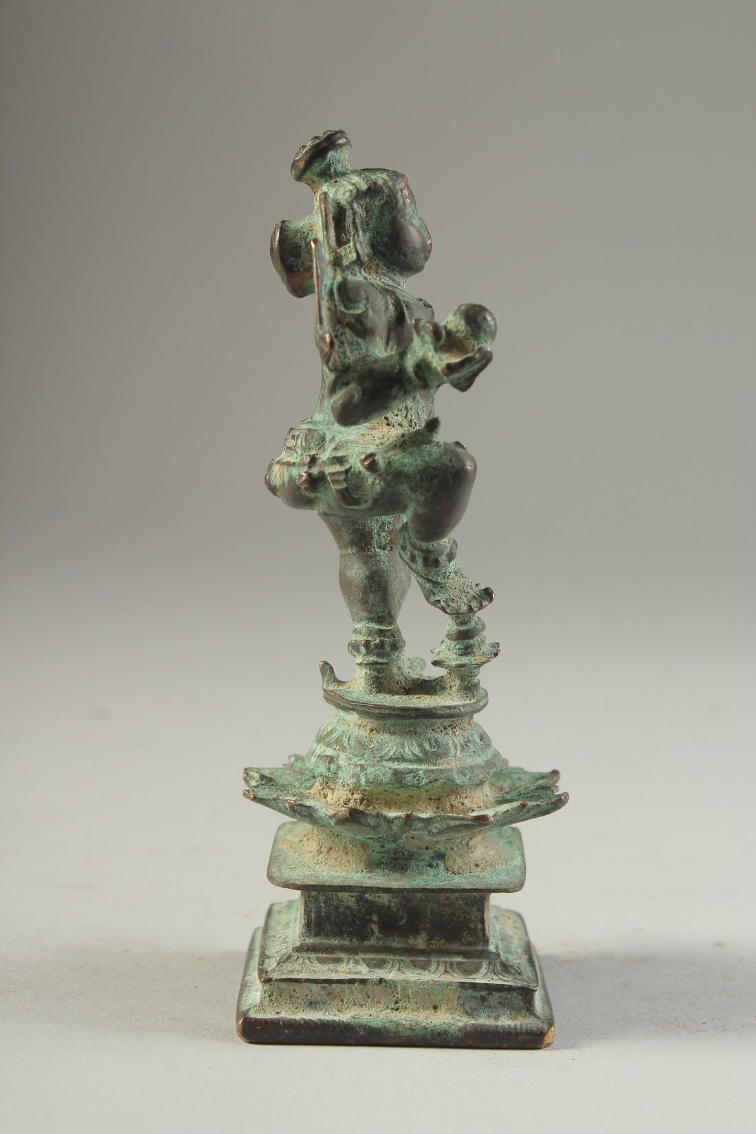 A FINE 16TH-17TH CENTURY SOUTH INDIAN BRONZE FIGURE OF BABY KRISHNA, stand on a lotus form base, - Image 2 of 4