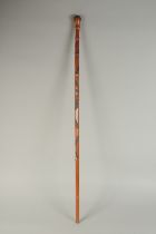 A CHINESE BAMBOO WALKING STICK, carved with snakes and frogs, inscribed /signed to lower section,