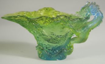 A LIULI GONG FANG GLASS DRAGON CUP, inscribed to the base, serial no. 1067/1200, 17cm long.