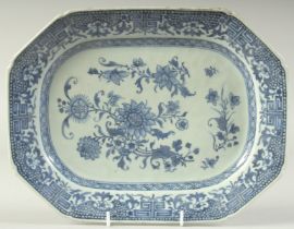 A CHINESE BLUE AND WHITE PORCELAIN RECTANGULAR SERVING DISH, painted with floral sprays, 29.5cm x