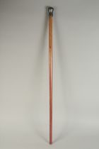 A WOODEN WALKING STICK WITH INDIAN BIDRI SILVER INLAID KNOB, 89cm long.