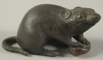 A JAPANESE BRONZE OKIMONO OF A MOUSE, the base with character mark, 9cm long.