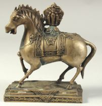 A TIBETAN BRASS FIGURE OF A HORSE, 15cm long.