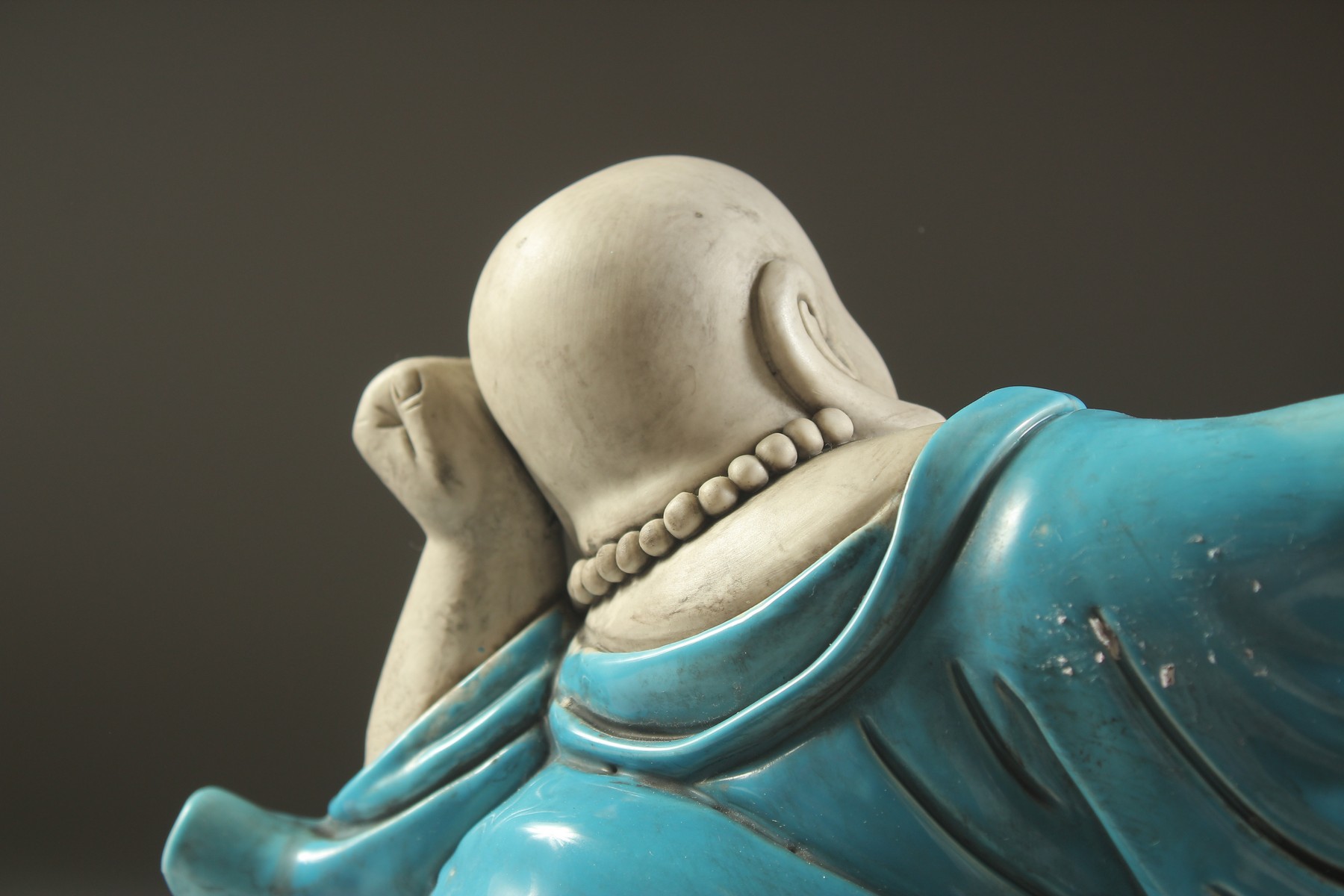 A LARGE TURQUOISE GLAZED POTTERY HAPPY BUDDHA, in reclining position with coiled dragon at his feet, - Image 6 of 7