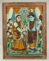 A LARGE LATE 19TH CENTURY SOUTH INDIAN TANJORE REVERSE PAINTING ON GLASS, depicting Krishna and