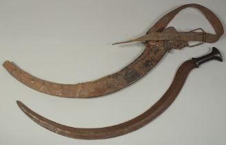 AN 18TH-19TH CENTURY ETHIOPIAN CURVING RHINO HORN HILTED SWORD, with scabbard, 74cm long overall.
